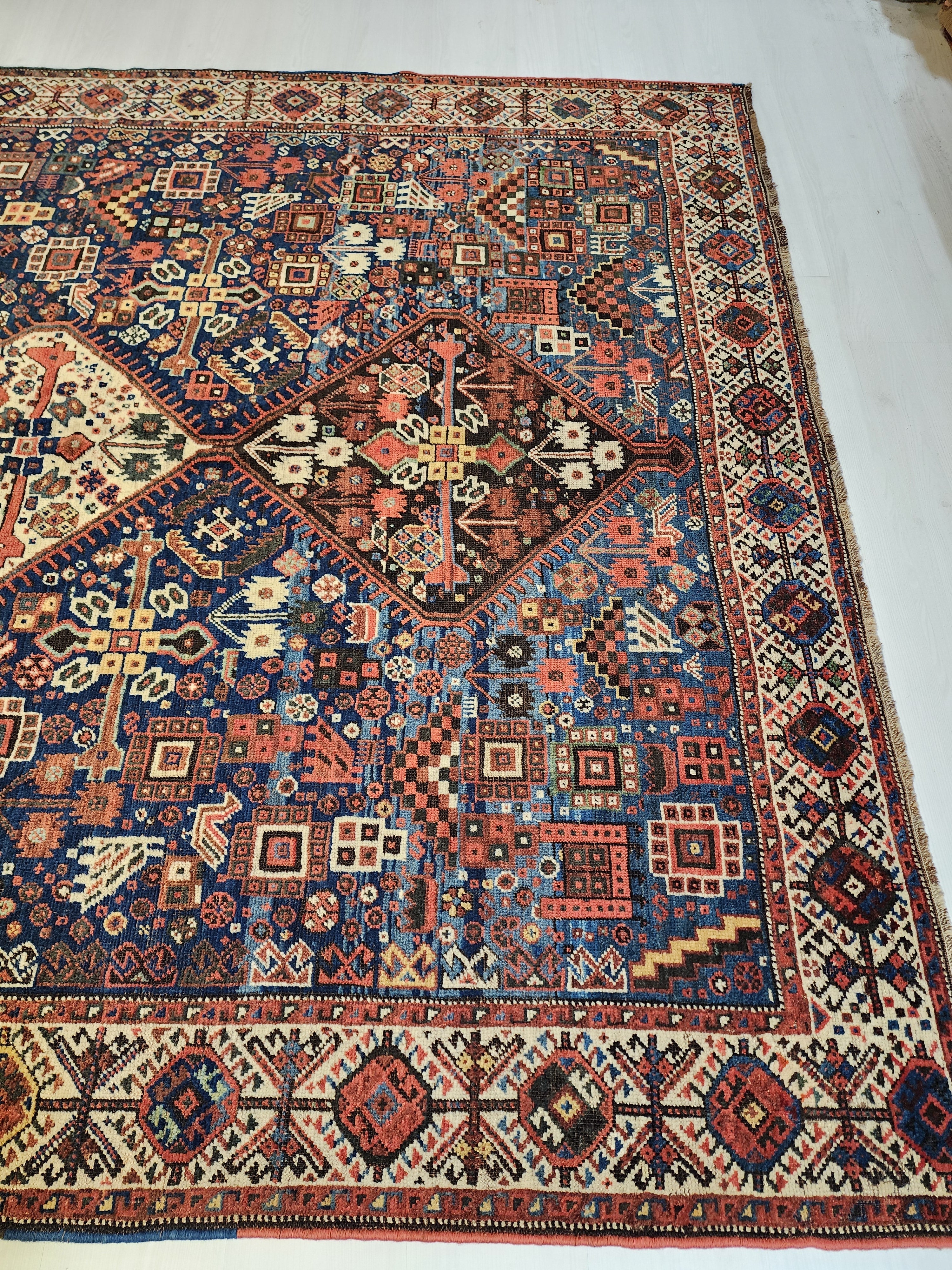 antique Caucasian Shirvan Wool Large Area Rug — in setting