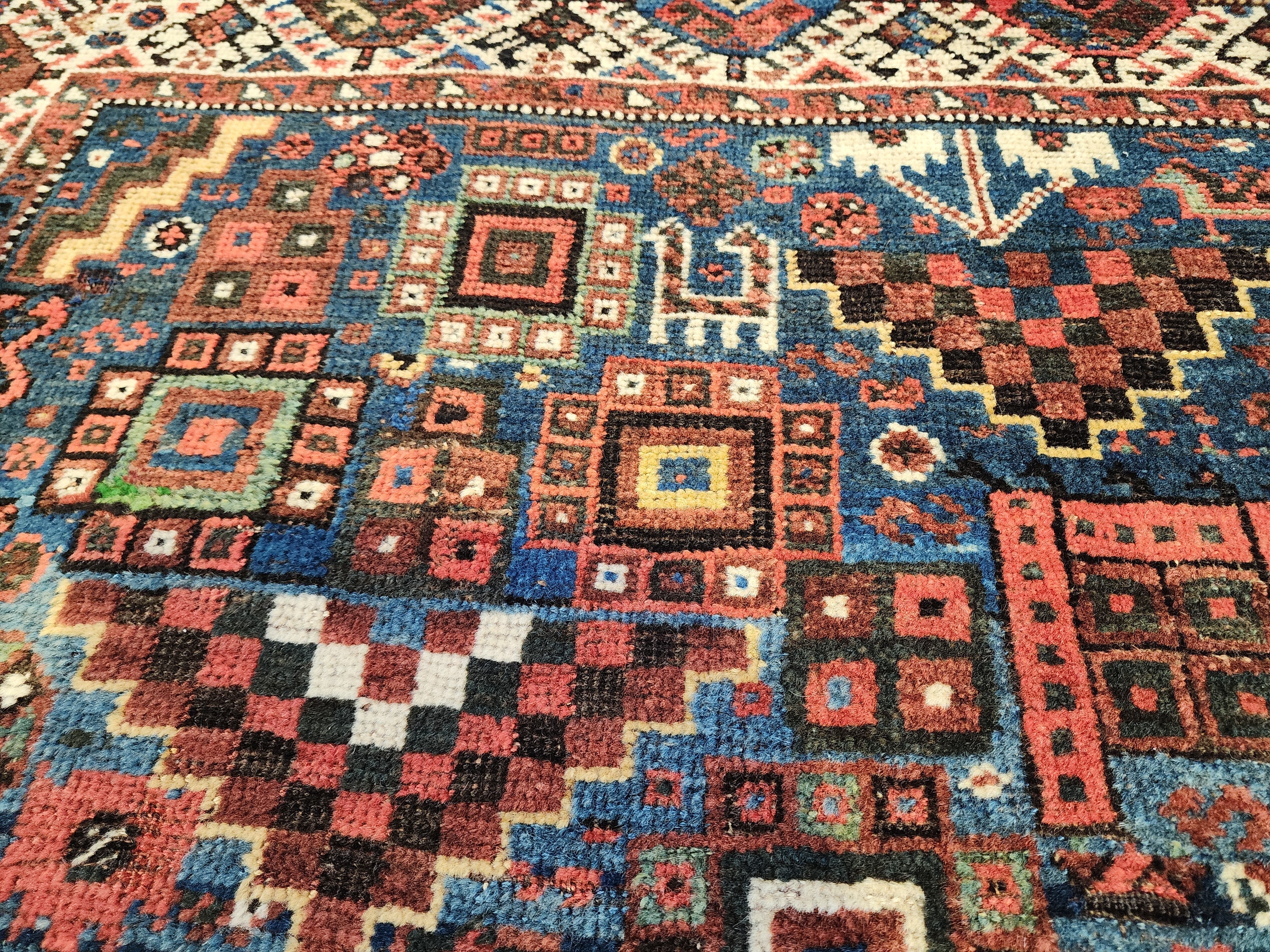 antique Caucasian Shirvan Wool Large Area Rug — styled view
