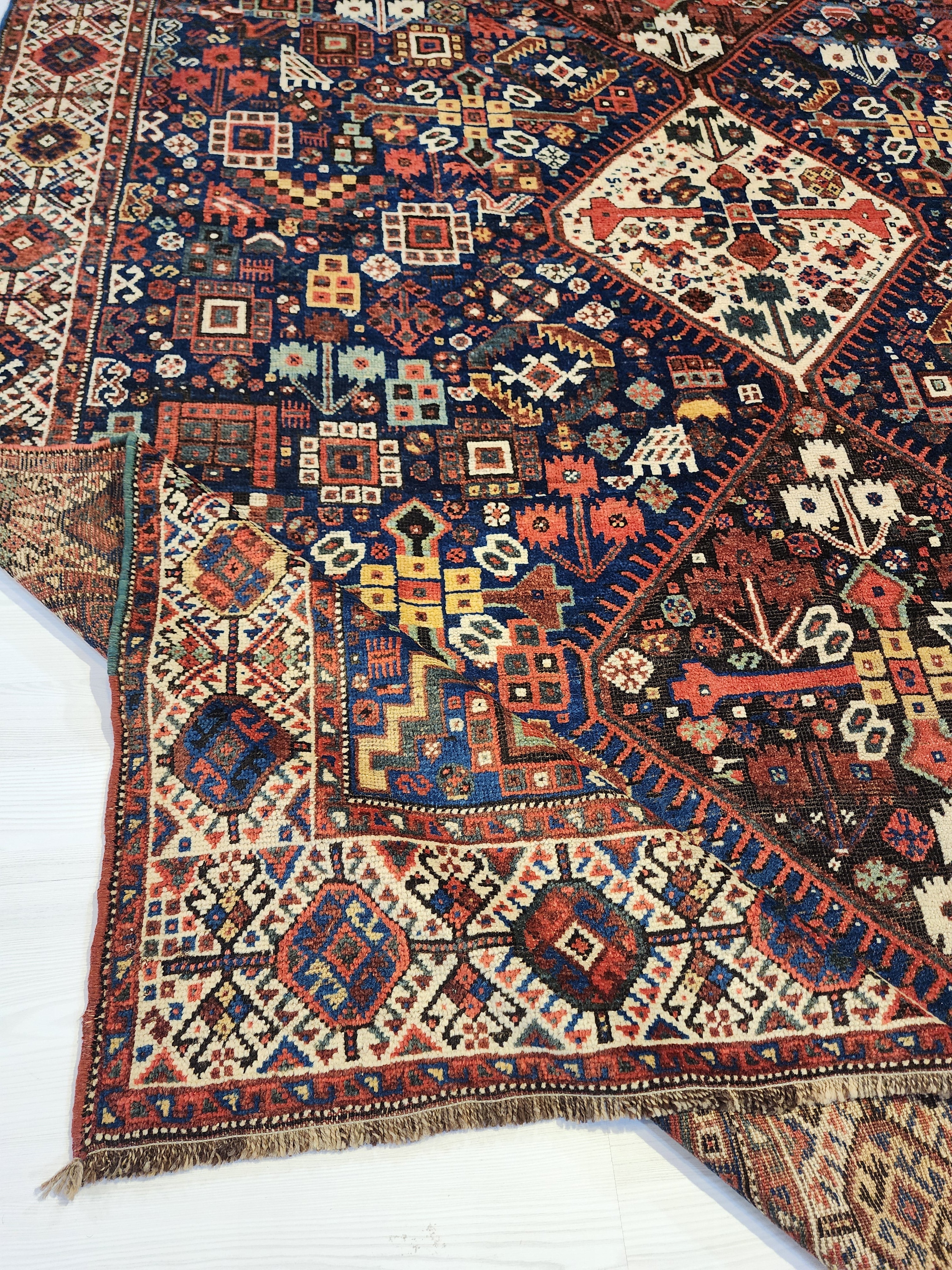 antique Caucasian Shirvan Wool Large Area Rug — styled view
