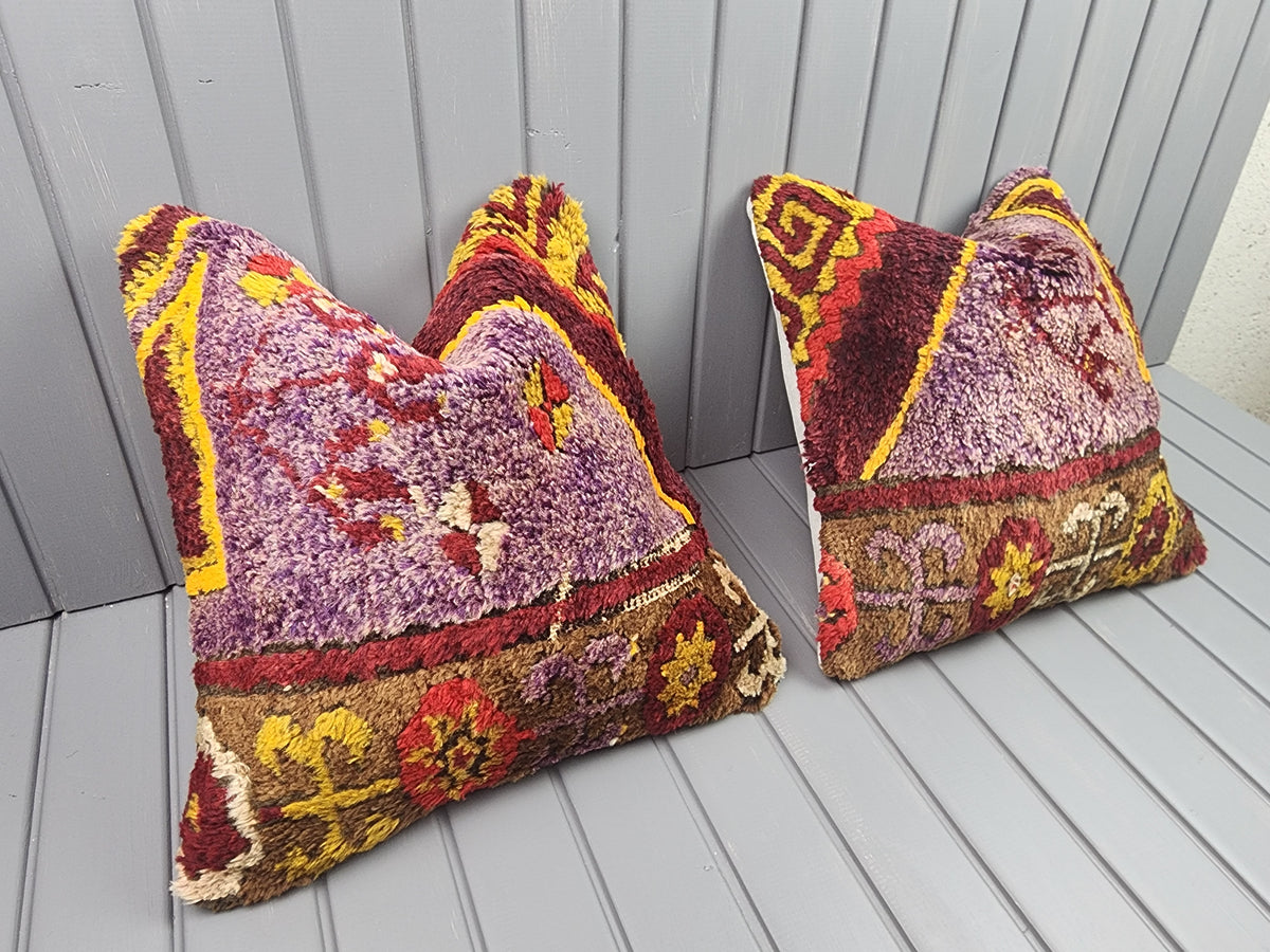 Antique Konya Tulu shaggy pillow covers, set of 2, purple and yellow, 16x16 in, pair, angled view