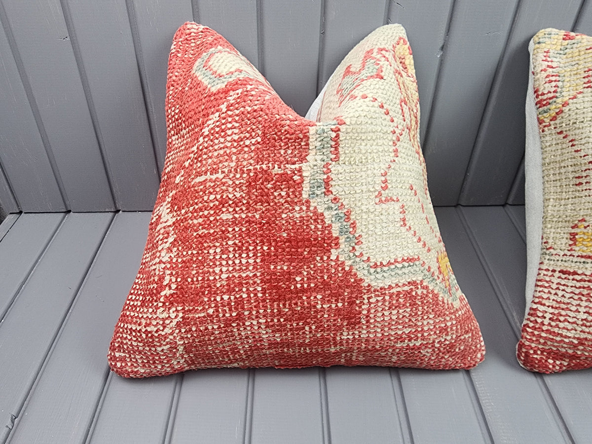 Antique Oushak rug pillow covers, set of 2, red and ivory, 16x16 in, single cover close-up