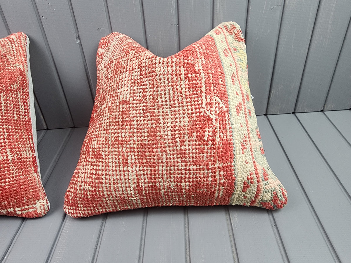 Antique Oushak rug pillow covers, set of 2, red and ivory, 16x16 in, single cover close-up