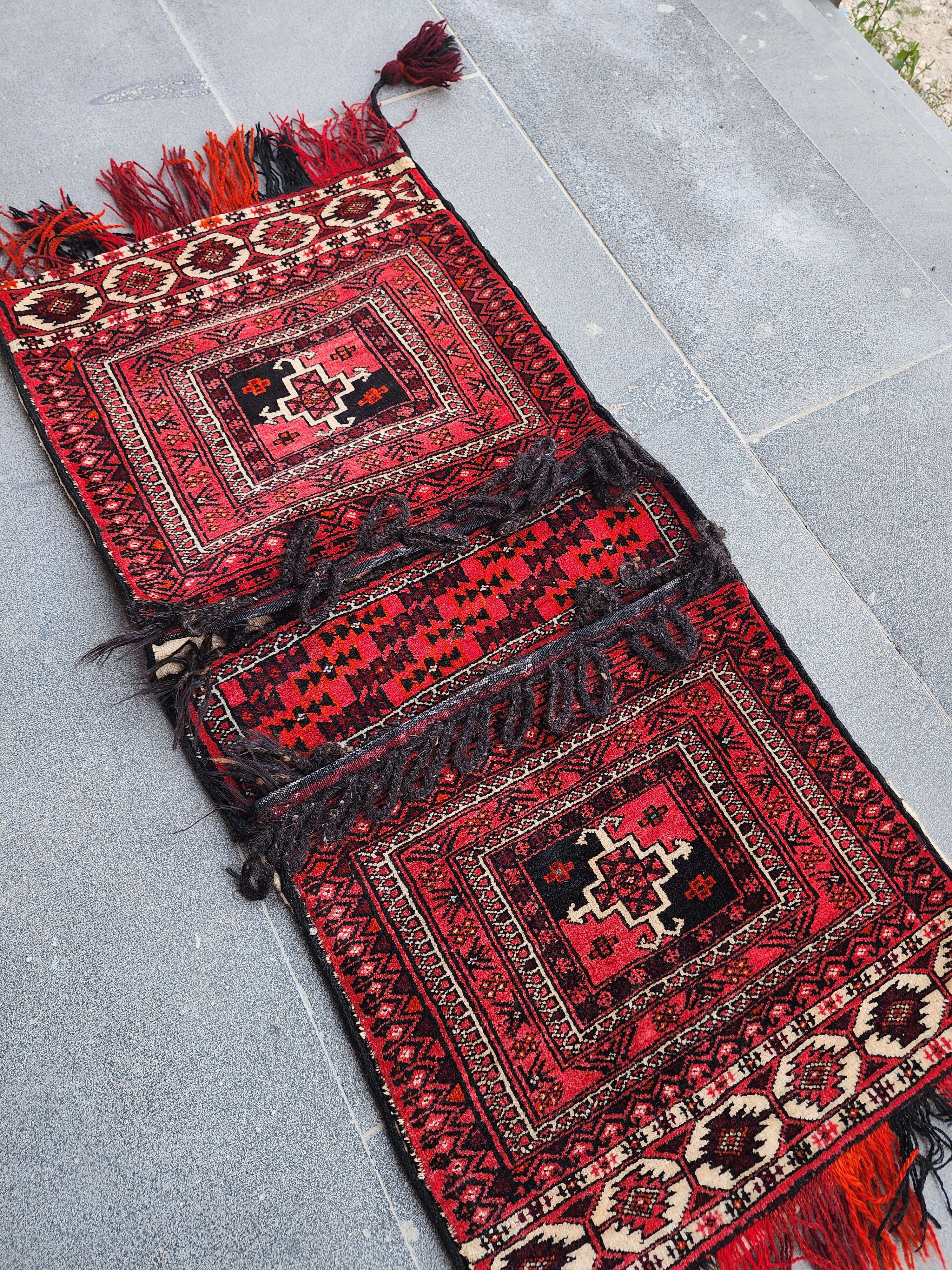 Vintage Turkish Wool Saddlebag Rug: Red and Black Anatolian Decor