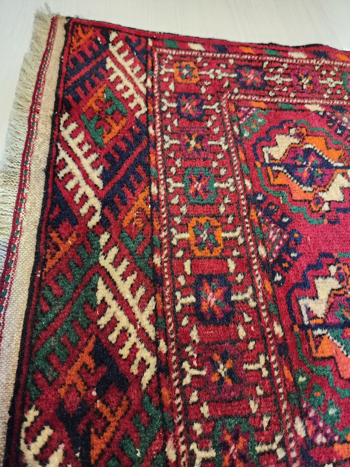 boakhara Turkmen Handmade Red and Orrange Rug, 1'11'' x 3'8'' — edge weave