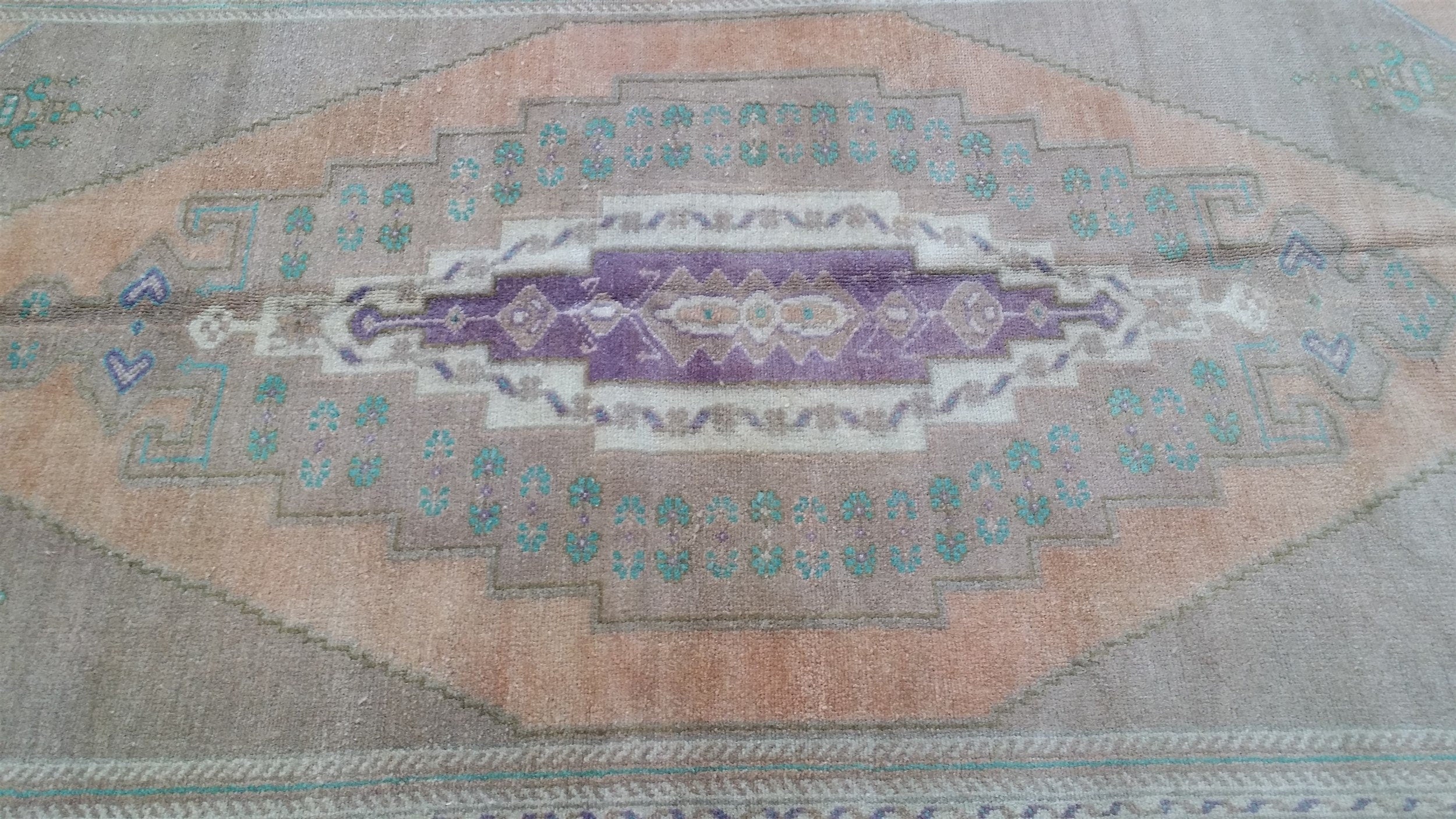 antique Oushak Wool Area Rug — in setting