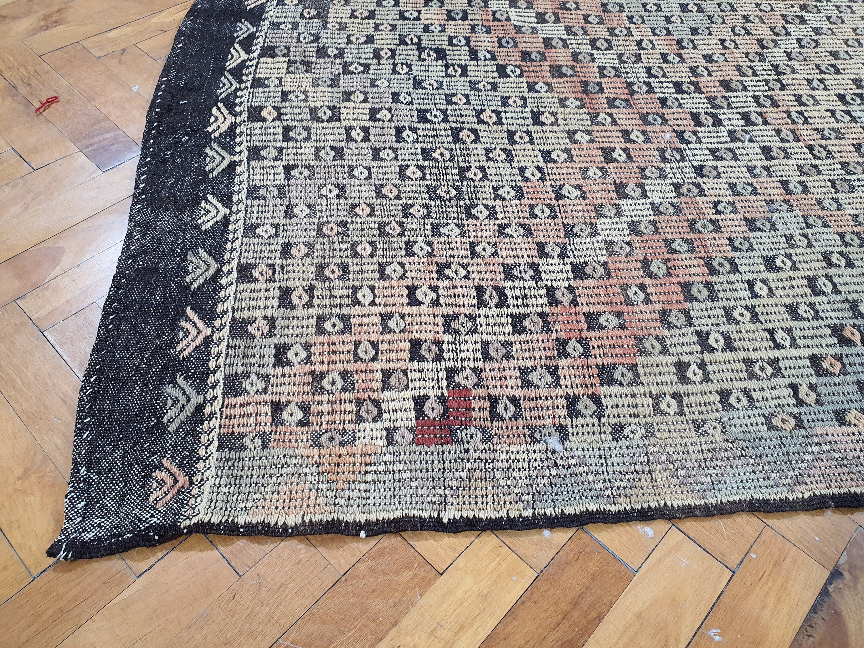 antique Konya Wool Area Rug — in setting