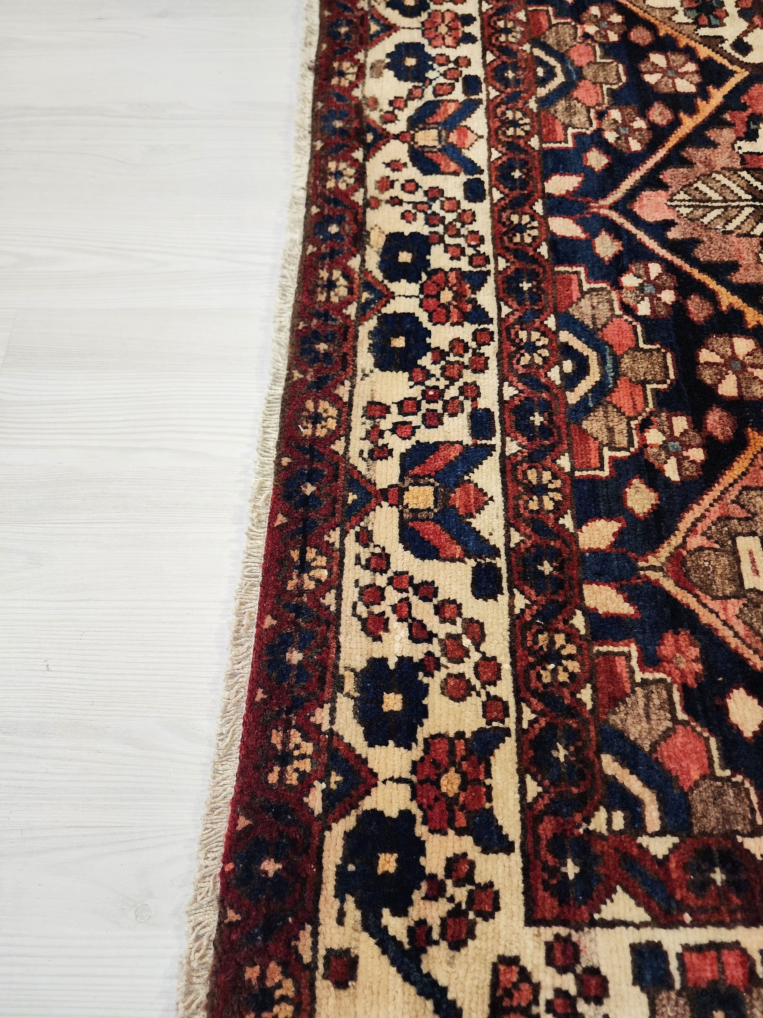 antique Persian Wool Large Area Rug — styled view