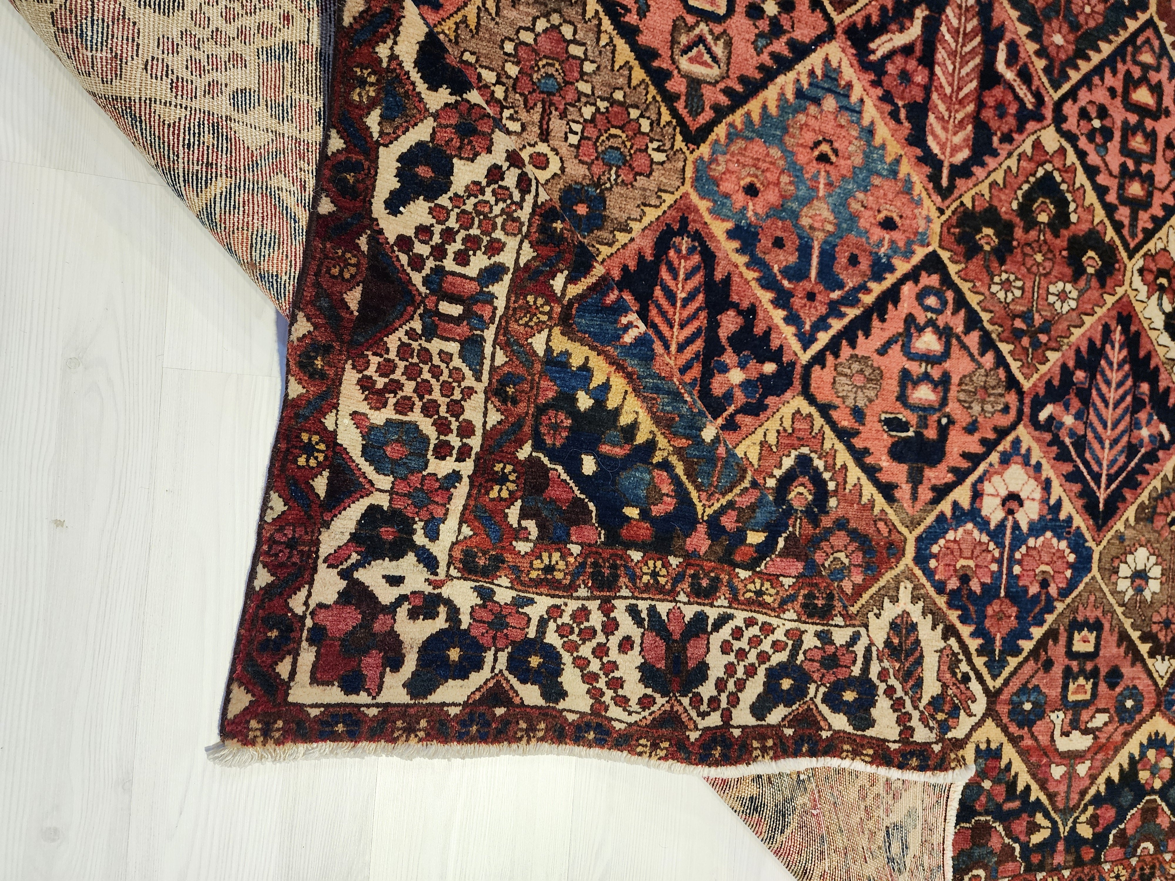 antique Persian Wool Large Area Rug — styled view