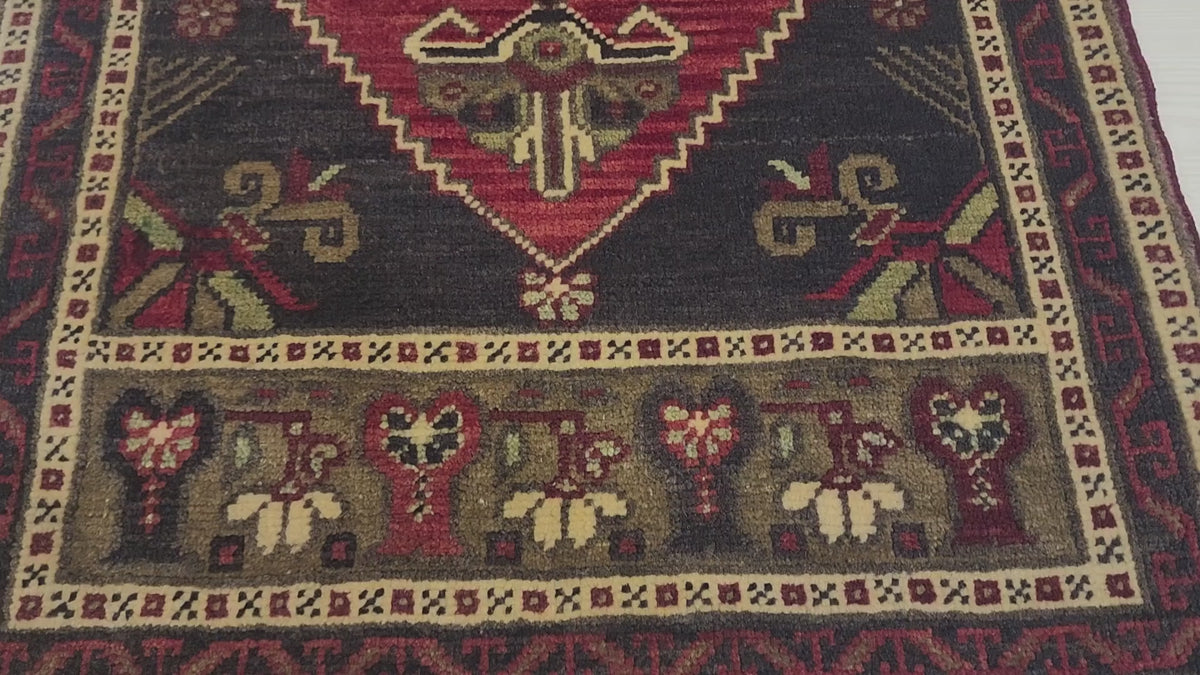 Vintage Konya rug in red, blue and brown, 1'9" x 3'7", video