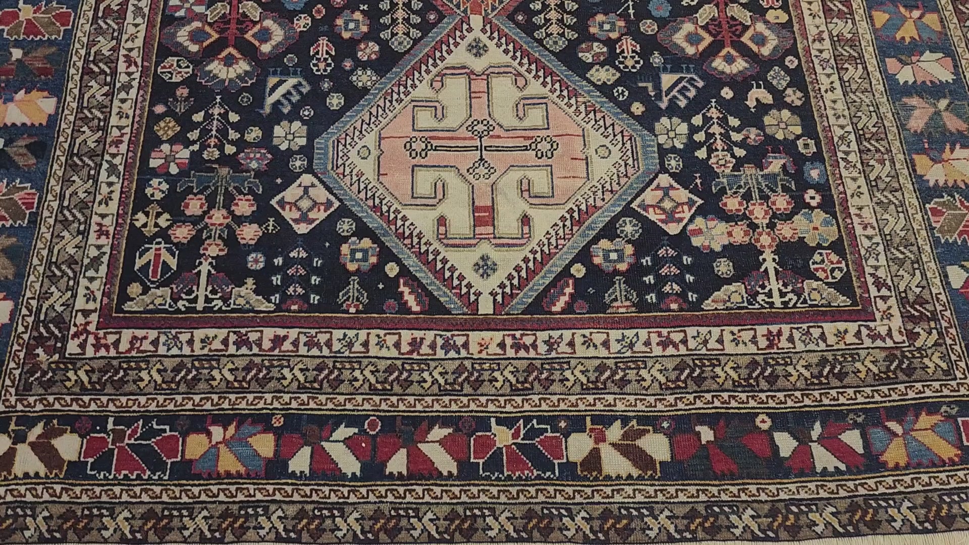 Antique Afshar rug in blue, brown and pink, 5'6" x 7', video