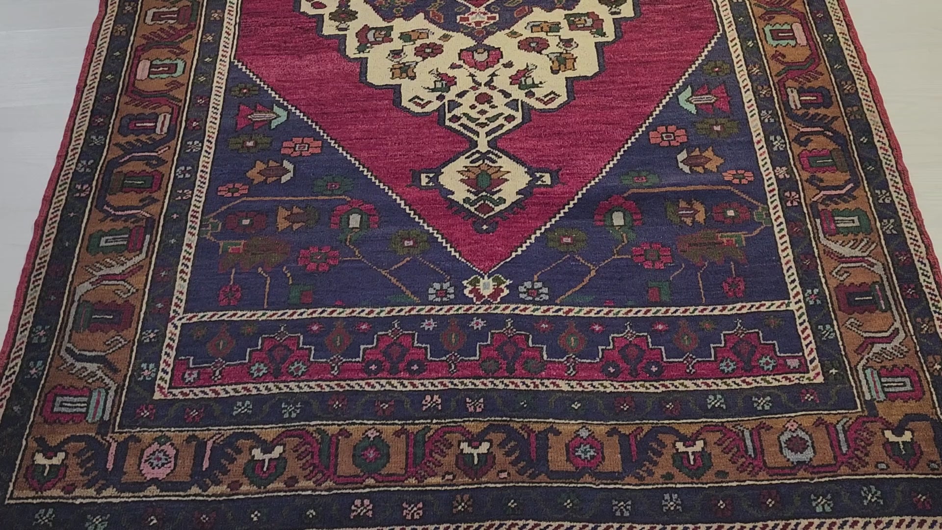 Vintage Işıklar rug in blue, red and brown, 4'8" x 7'2", video