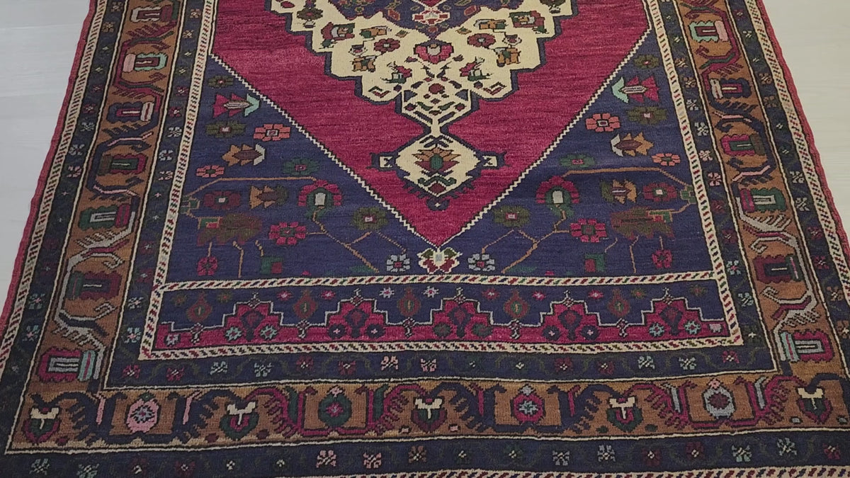 Vintage Işıklar rug in blue, red and brown, 4'8" x 7'2", video