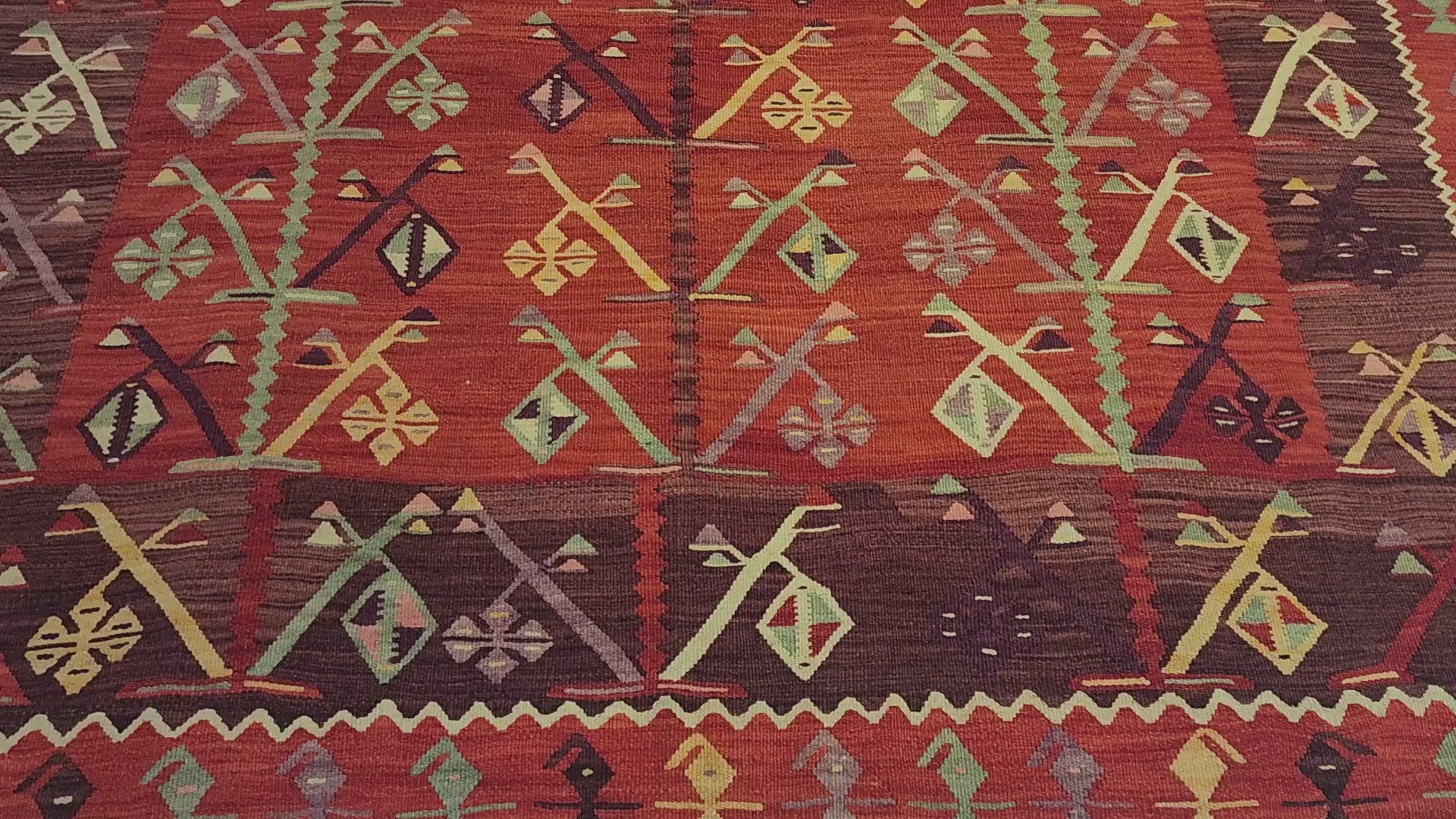 Antique Göçmen kilim rug in red, purple and green, 6'10" x 9'8", video