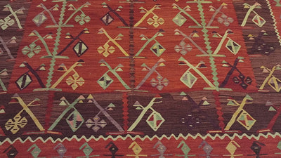 Antique Göçmen kilim rug in red, purple and green, 6'10" x 9'8", video