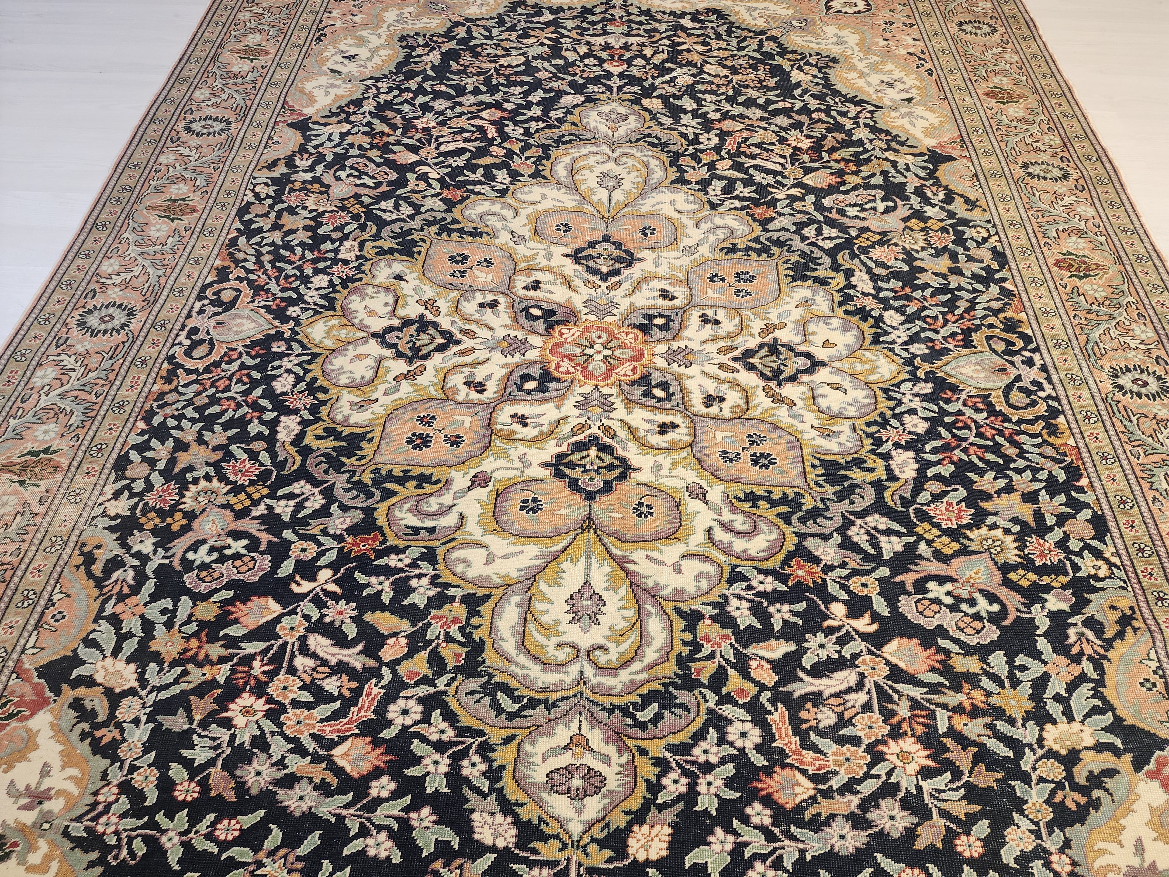 Vintage Handwoven Turkish Hereke Style Rug, Navy Blue Floral Wool Carpet