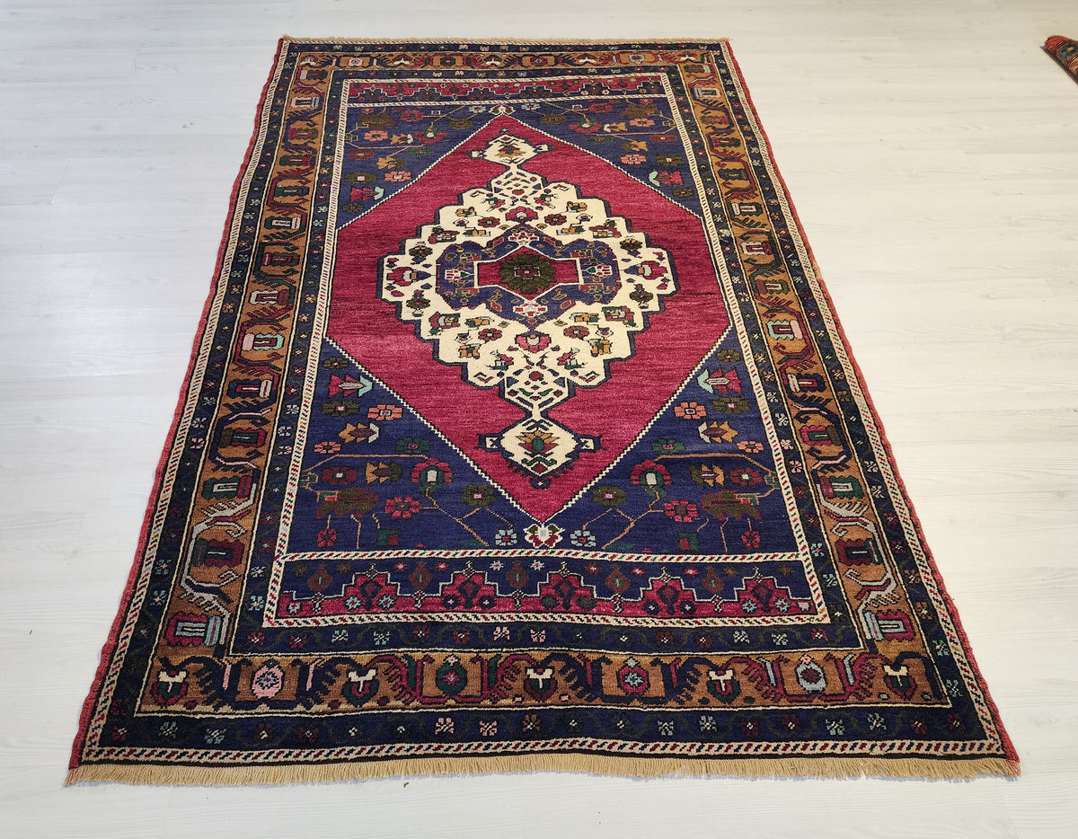 Vintage Işıklar rug in blue, red and brown, 4'8" x 7'2", full view