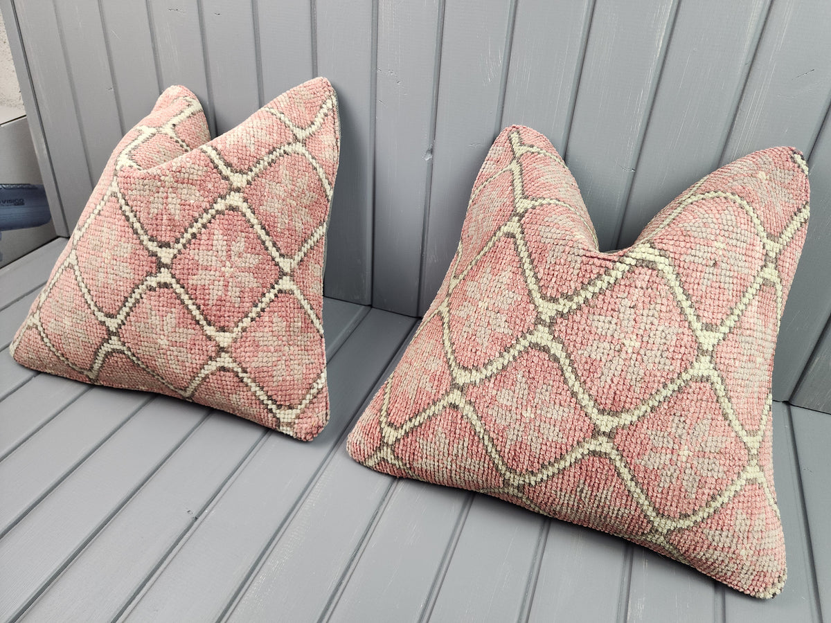 Vintage Oushak rug pillow covers, set of 2, pink, 16x16 in, pair, angled view