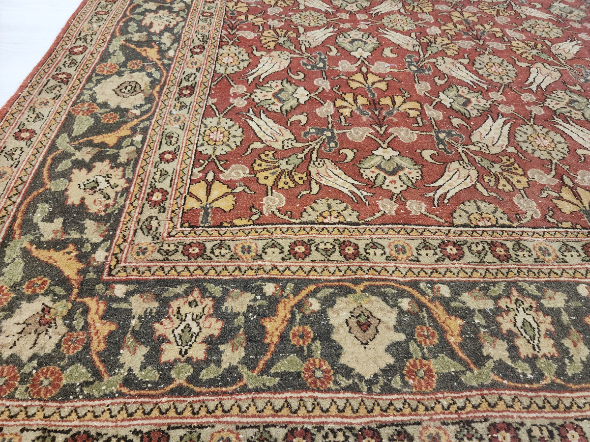 Vintage Hand-Knotted Hereke Tulip Rug, Red Floral Anatolian Carpet (5' x 7'7")