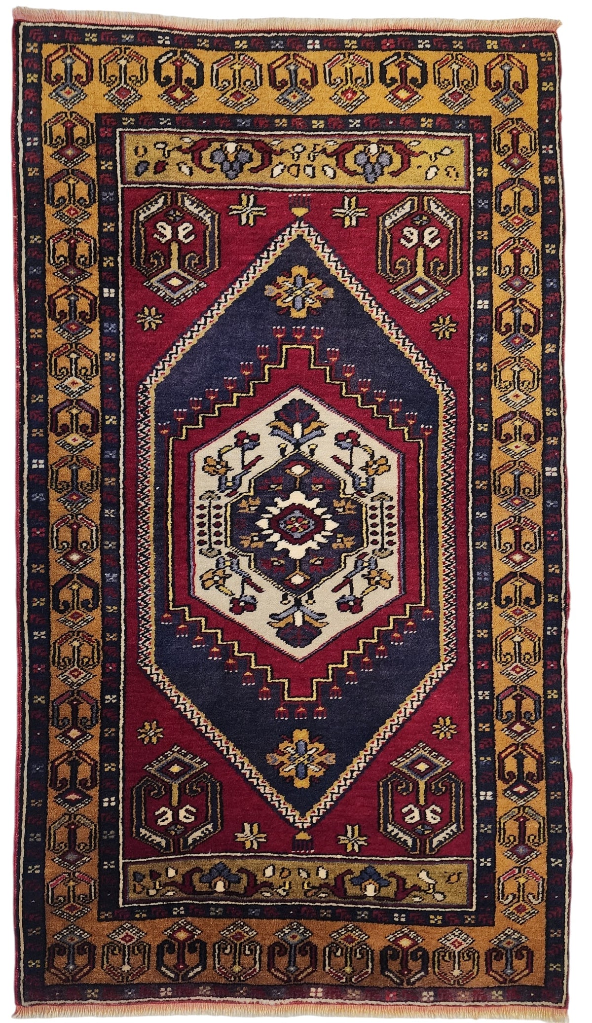 Vintage Yahyalı rug in red, blue and yellow, 3'2" x 5'5", full view