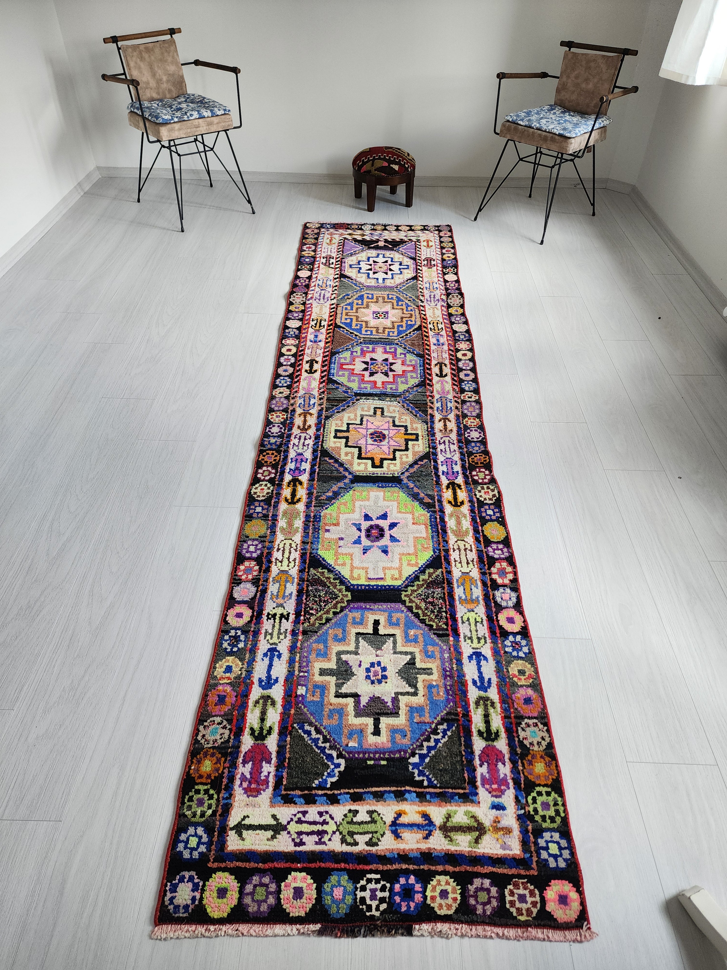 Vibrant Tribal Herki Runner with Geometric Medallions