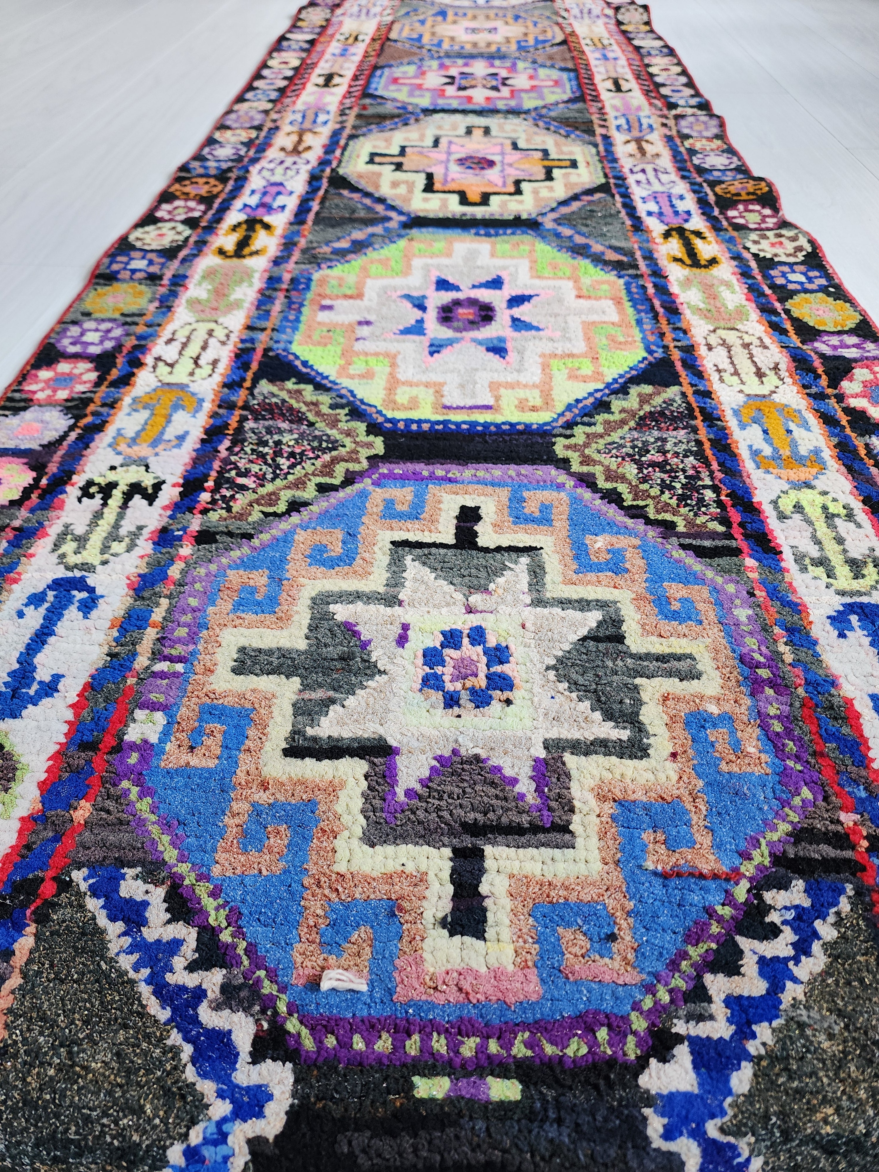 Vibrant Tribal Herki Runner with Geometric Medallions