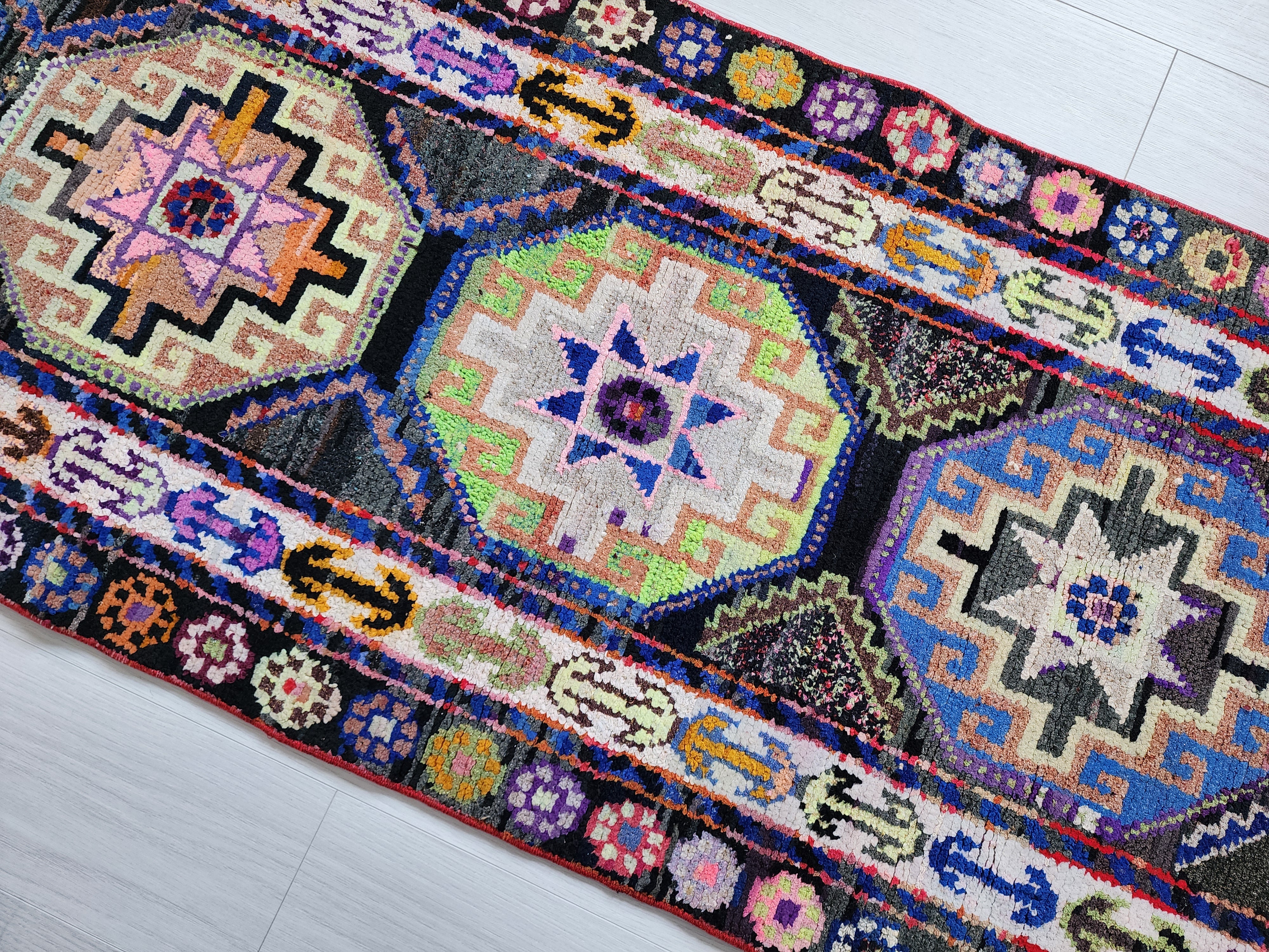 Vibrant Tribal Herki Runner with Geometric Medallions