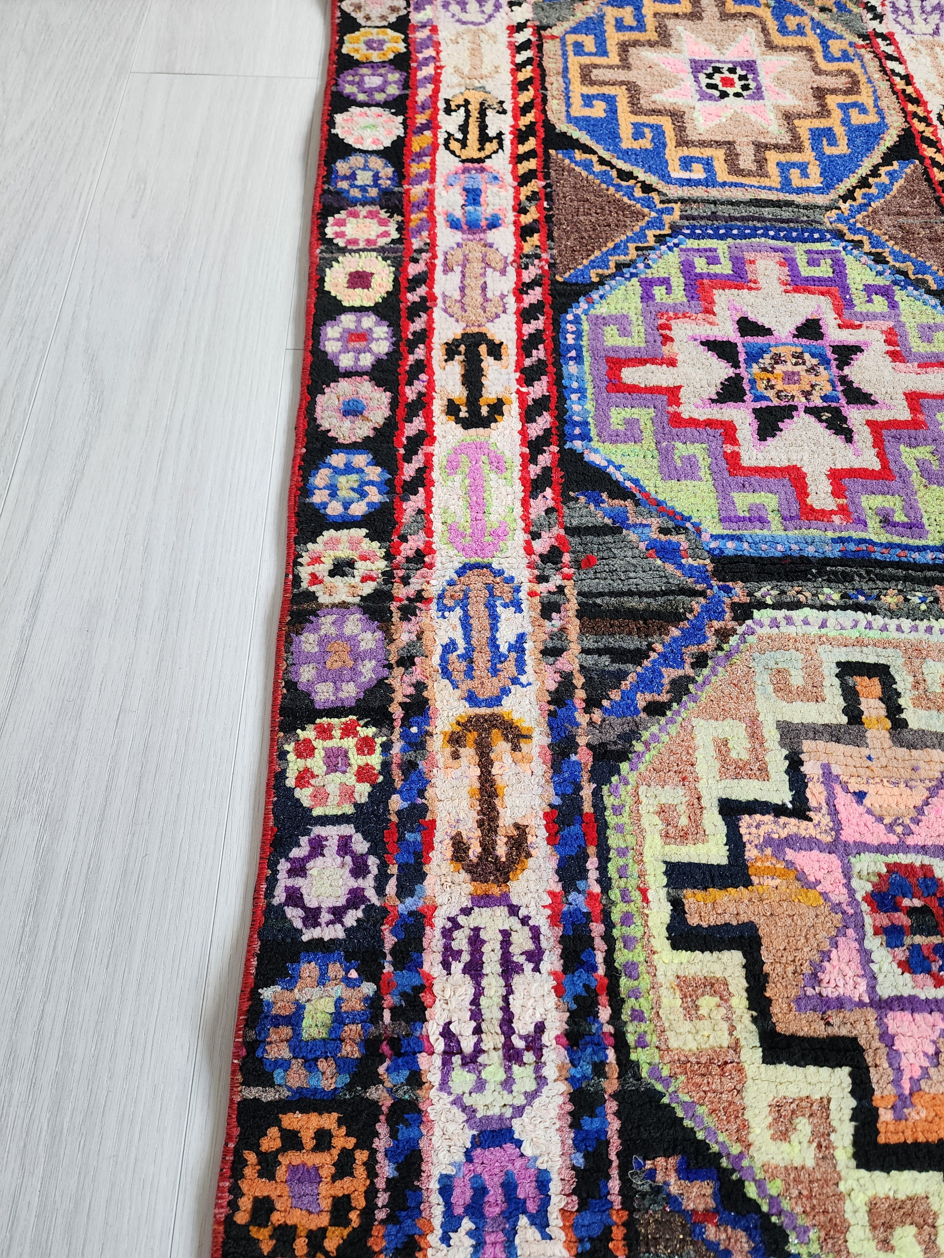 Vibrant Tribal Herki Runner with Geometric Medallions