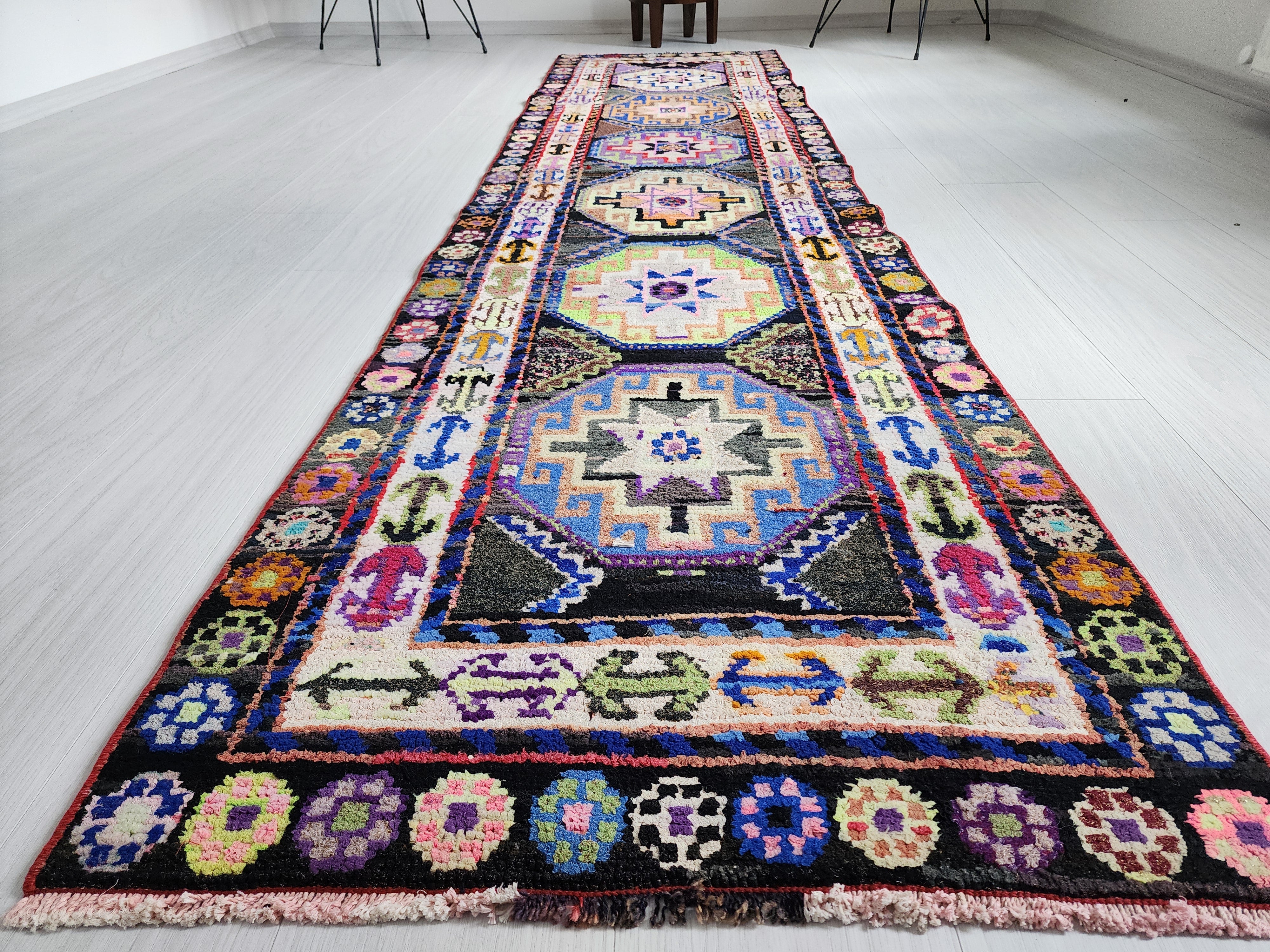 Vibrant Tribal Herki Runner with Geometric Medallions