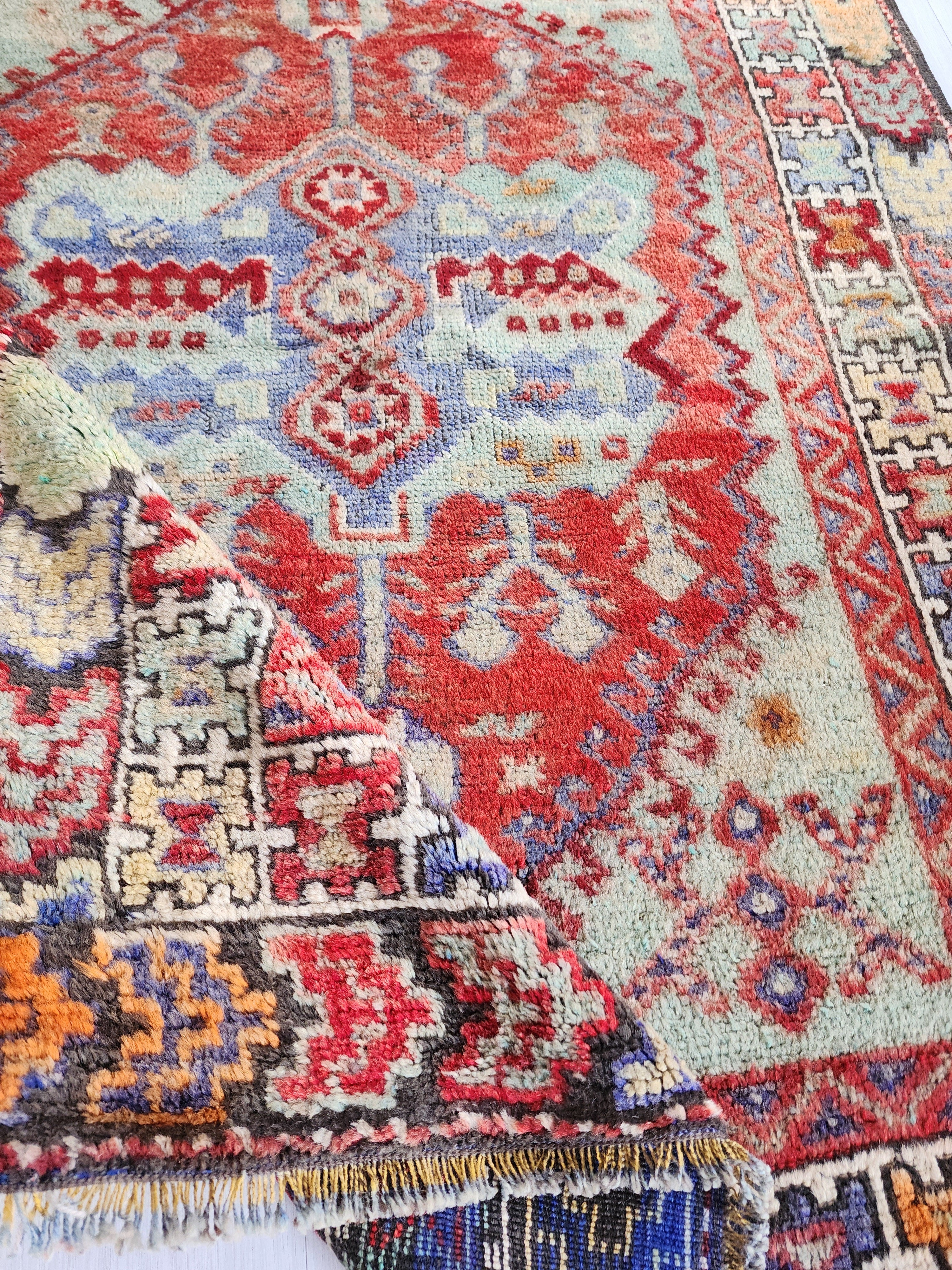 Hand-Knotted Anatolian Konya Rug with Rich Reds and Earthy Tones