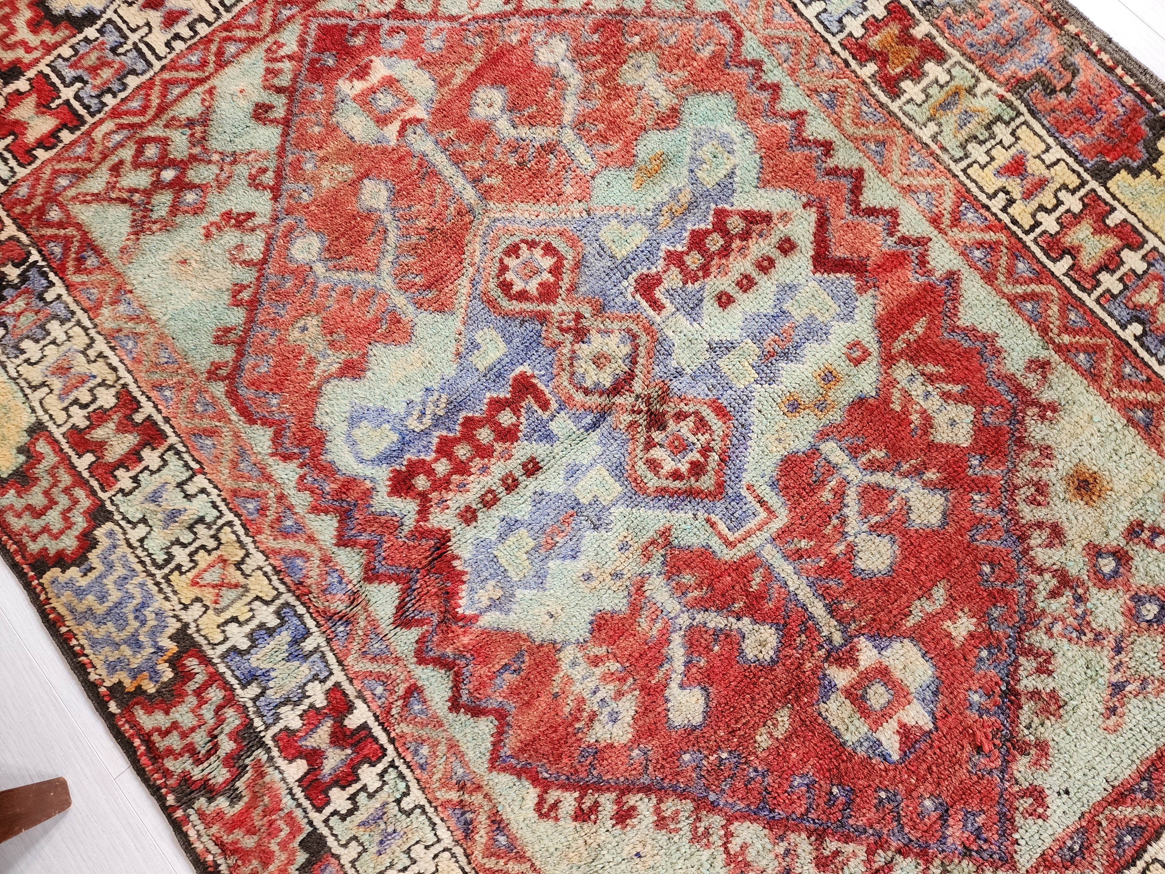 Hand-Knotted Anatolian Konya Rug with Rich Reds and Earthy Tones
