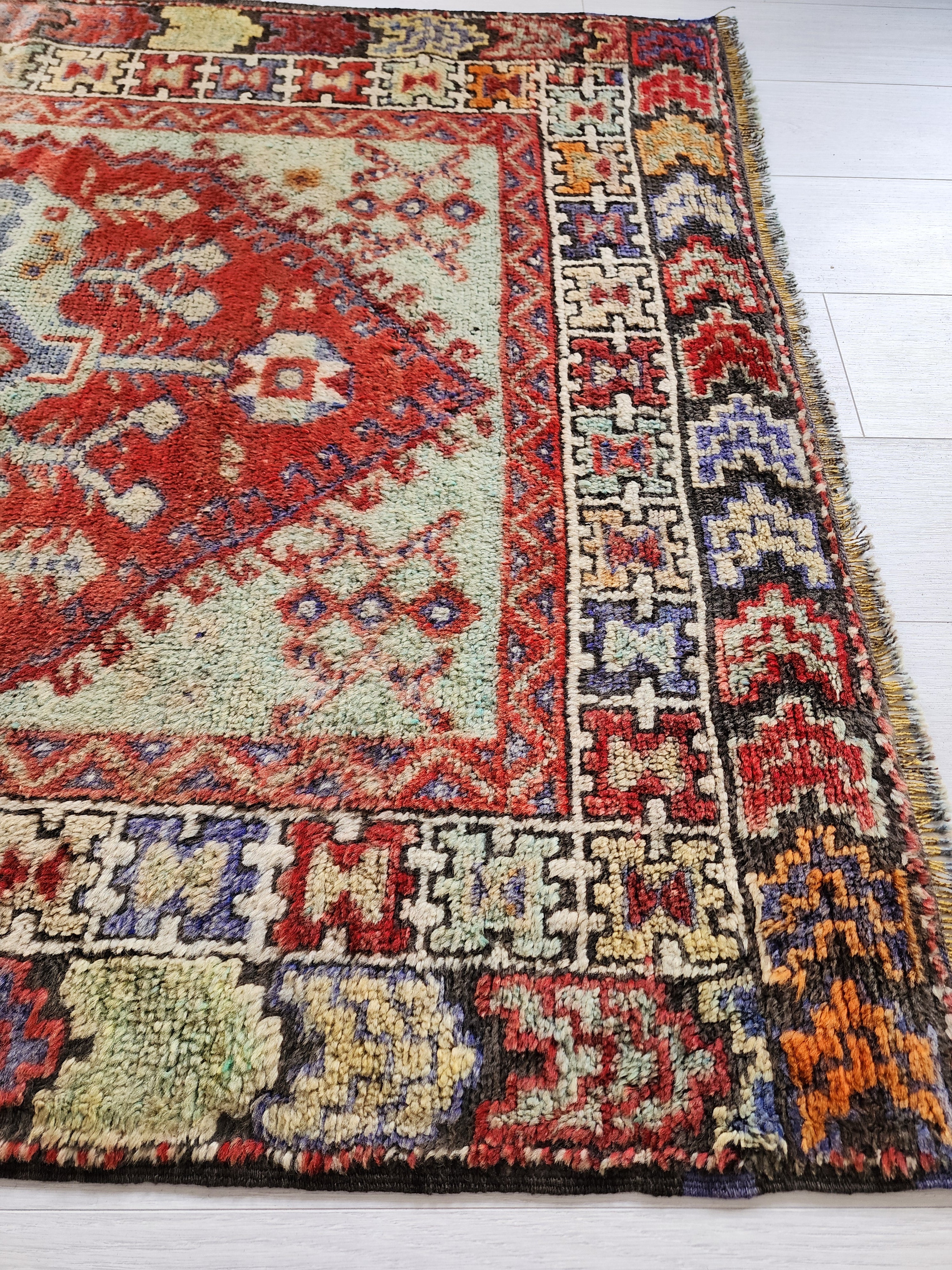Hand-Knotted Anatolian Konya Rug with Rich Reds and Earthy Tones