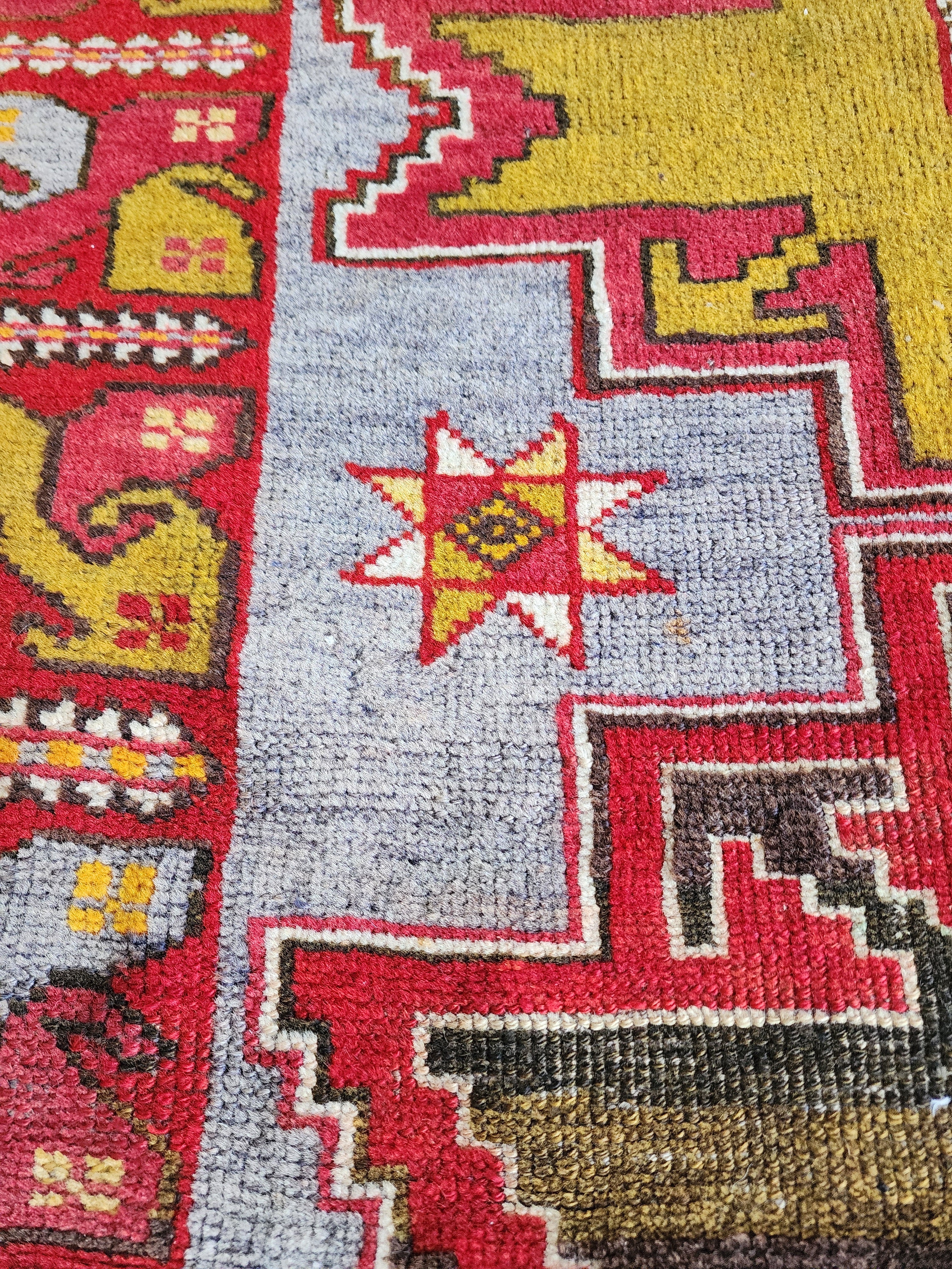 Antique Turkish Konya Rug with Tribal Bird Border – A Masterpiece of Anatolian Folk Art